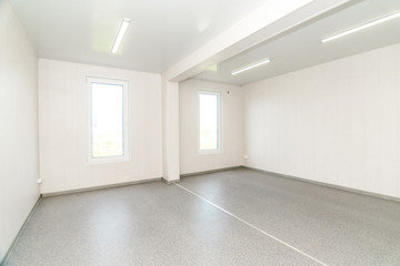 Light white empty office room with bright lighting
