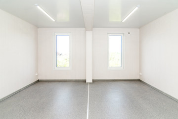 Light white empty office room with bright lighting