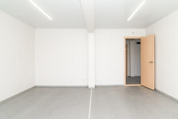 Light white empty office room with bright lighting