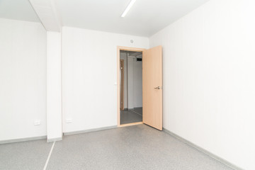 Light white empty office room with bright lighting
