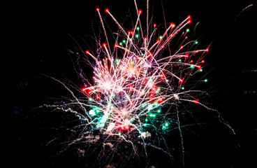 Colorful fireworks in the sky on black background