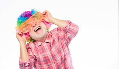 Man senior bearded cheerful person wear colorful wig and sunglasses. Having fun. Funny lifestyle. Fun and entertainment. Comic grandfather concept. Nice joke. Grandpa always fun. Elderly clown