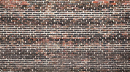 Old brick wall made of red and gray blocks