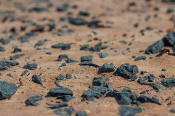The dirt and gravel road washed by the rain