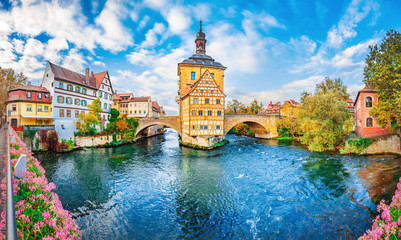 Old town Bamberg in Bavaria, Germany. Romantic  historical town on Romantic road in Bavaria,  located on crossing of Regnitz and Main rivers. Autumn view of old Timber Framing architecture and flowers