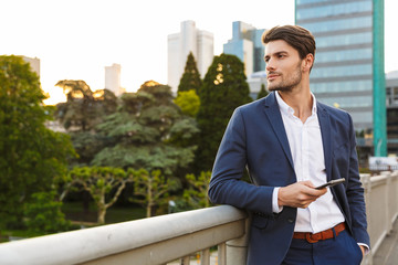 Handsome young businessman smartly dressed