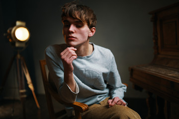 young man with glass of red wine