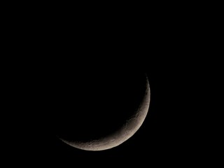 Fototapeta na wymiar The moon when it becomes a crescent
