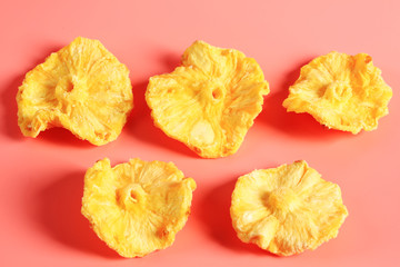 pineapple snacks on a pink background
