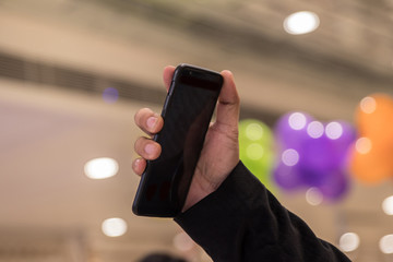 hand holding mobile smart phone