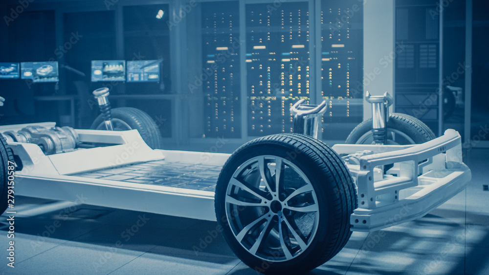 Poster Automobile Engineers Discussing and Designing Electric Car Chassis Platform Using Tablet Computers with 3D CAD Software. In Automotive Innovation Facility Vehicle Frame with Wheels, Engine and Battery