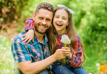 Keep allergies from ruining your life. Seasonal allergies concept. Outgrow allergies. Happy family vacation. Father and little girl enjoy summertime. Dad and daughter blowing dandelion seeds