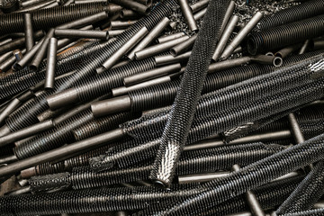 Steel pipes with spiral fins. Details of industrial convector radiators.