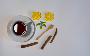 Black tea with lemon and cinnamon.