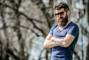 bearded man with lush hair. Free and happy time. male fashion and beauty. Bearded man outdoor. Beard care and barbershop. Mature hipster with beard. brutal male with perfect style. Cool and confident