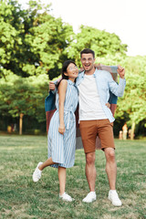 senior couple walking in the park