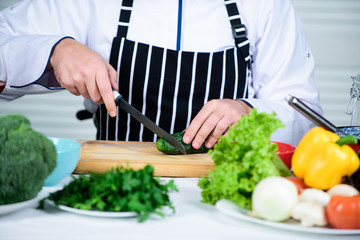 So tasty. Vegetarian. Healthy food cooking. Chef man in hat. Secret taste recipe. Dieting and organic food, vitamin. man cook in kitchen, culinary