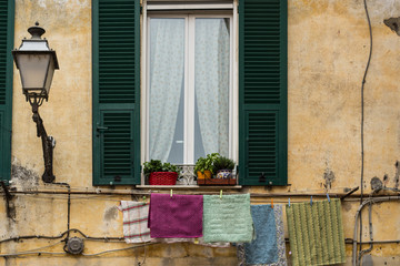 Italian window  with clothes hanging