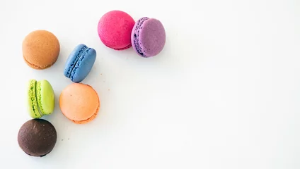 Garden poster Macarons Colorful macarons on white background, close up view