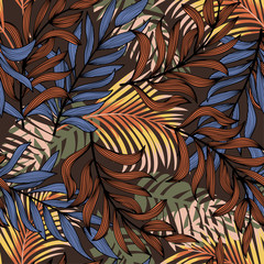 Summer abstract seamless pattern with colorful tropical leaves and plants on a brown background. Vector design. Jungle print. Flowers background. Printing and textiles. Exotic tropics. Fresh design.