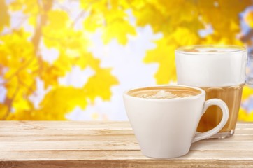 Coffee cup  on wooden background