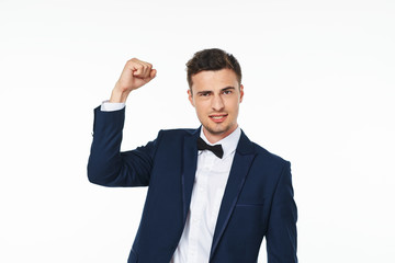 happy businessman with arms up