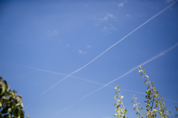 Vertical and horizontal lines in the sky. Peace. Aviation. Travel concept.