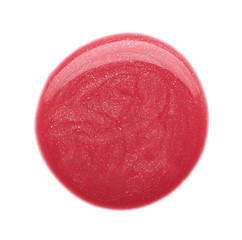 Gently pink strokes and texture of lip gloss or acrylic paint isolated on white background