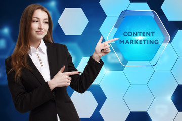 The concept of business, technology, the Internet and the network. A young entrepreneur working on a virtual screen of the future and sees the inscription: Content marketing