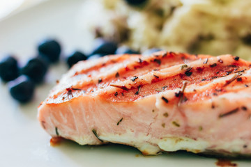 Grilled salmon slice close up