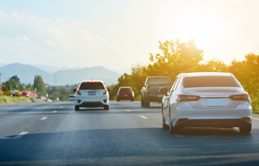 Car Driving on road and Small passenger car seat on the road used for daily trips