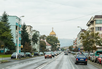 Fototapeta na wymiar Mihai Eminescu Street - the central street of the Fagaras city in Romania