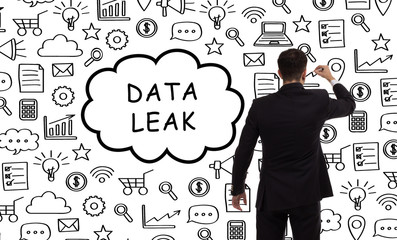 Business, technology, internet and networking concept. Young entrepreneur showing keyword: Data leak