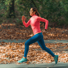 Woman Jogging Outdoors in Park