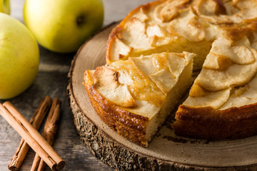 Homemade apple pie on wooden table. Close up
