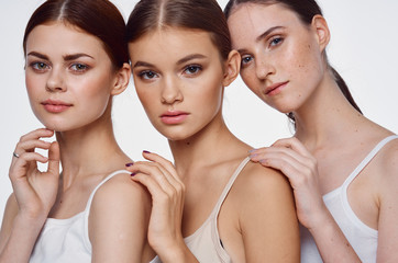 three girls with perfect skin