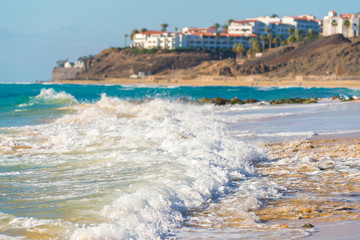 Sea surf on a sandy beach Canary Islands
