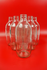 the bottles on red background
