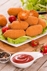 Supplì, italian fried rice balls.