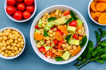 Summer Lunch Bowl With Avocado Chickpeas Tomatoes and Bulgur Wheat