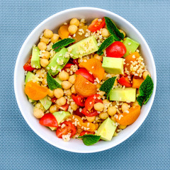 Summer Lunch Bowl With Avocado Chickpeas Tomatoes and Bulgur Wheat