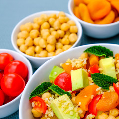 Summer Lunch Bowl With Avocado Chickpeas Tomatoes and Bulgur Wheat