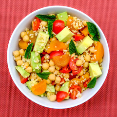 Summer Lunch Bowl With Avocado Chickpeas Tomatoes and Bulgur Wheat