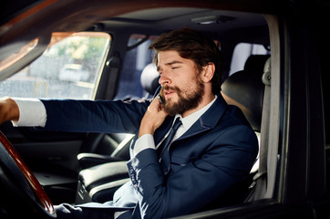 young man in a car