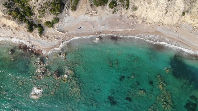 Calm aegean sea. Rhodes island. Wild beach.