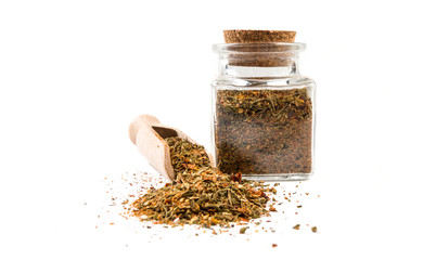 red savory mix or Chubritsa in wooden scoop and jar on isolated on white background. front view. spices and food ingredients.