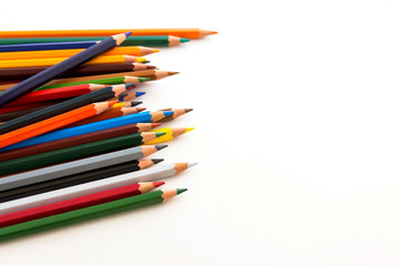 Figures with colored pencils on white background