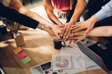 Teamwork,partnership and Social connection in business join hand together concept.Hand of diverse...