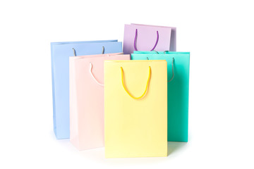 Multicolor paper bags isolated on white background