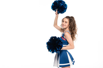 happy cheerleader girl in blue uniform dancing with pompoms isolated on white with copy space